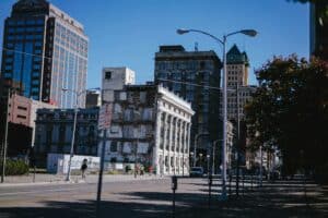 Urban landscape featuring a mix of modern and historic buildings in a Southern California city, illustrating the evolving commercial real estate environment.
